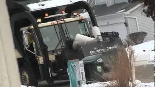 Garbage Truck Taking Huge Carpet Rolls