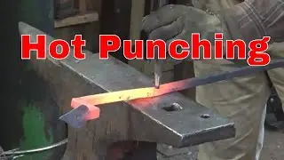 Punching holes in the rails for the window grill project