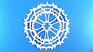 Paper snowflake tutorial - learn how to make snowflakes in 5 minutes.
