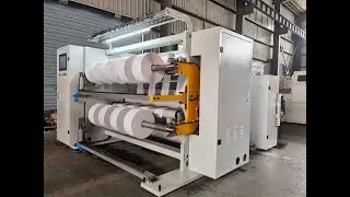 Adhesive label slitter rewinder