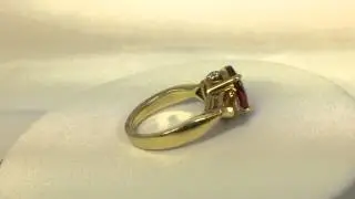 3 Stone Spessartite and Yellow Heart Sapphire Ring with Round Bezel Accents