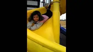 On the slide at Purple Heart Park