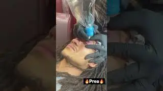 Prea does an eyelid tattoo