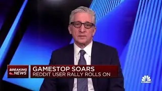 Stocks open lower as retail trading frenzy continues