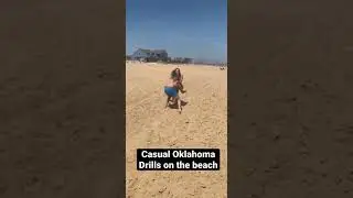 Girl gets rocked in Oklahoma Drill on the beach