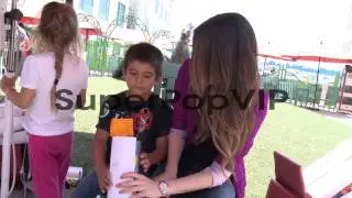 Miranda Cosgrove and fans at Miranda Cosgrove Visits Rady...