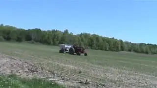 Spreading Fertilizer On My Peas & Oats