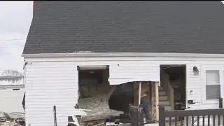 Car crashes into Long Island home
