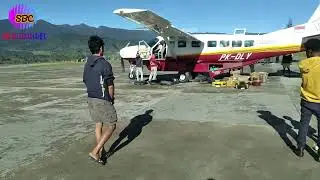 NAIK TRUK JEMPUT BARANG DI BANDARA ILAGA PAPUA