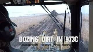 Leveling Slough Dozing Dirt CAT 973C