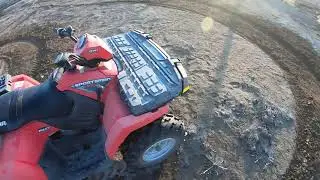 hooning around in a four wheeler (ALMOST FLIPPED IT)