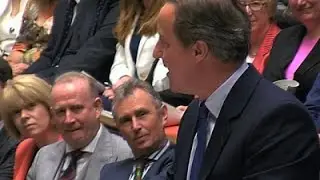 Cameron Receives Standing Ovation in Parliament
