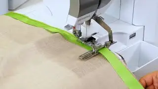 B&auml;nder und Spitze aufn&auml;hen mit der Einstellbaren Bandf&uuml;hrung f&uuml;r BERNINA Overlocker