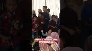 Serunya Acara Nabur Uang Di Pulau Bawean  Kabupaten Gresik
