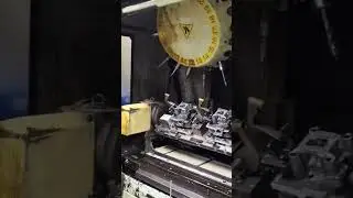 CNC,VMC M/C - Robot Drill machine . look the tools, fxtures, operator panel.