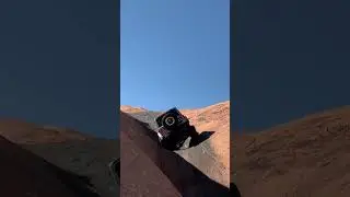 Jeep Wrangler rock crawling Hells Revenge trail in Moab Utah