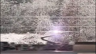Train sparks on overhead line slow motion freezing temperatures 2025