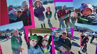 FAMILY WATCHING SANTA CLAUS LAND IN A HELICOPTER