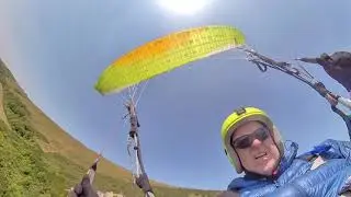 A nil wind day paragliding at Ballard Down, Swanage, Dorset