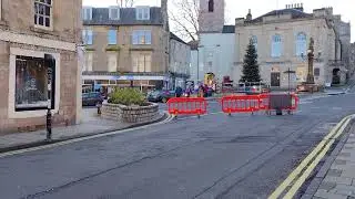 Jedburgh High Street on St. Andrews day with a market.