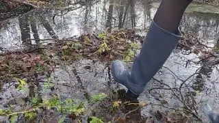 Grey High Heel Rubber Boots in Mud 4