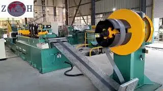 CNC step lap transformer core cut to length line with two O punch and one V notch