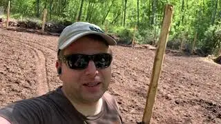 Digging a trench to stop rabbits: Garden fencing part 1.