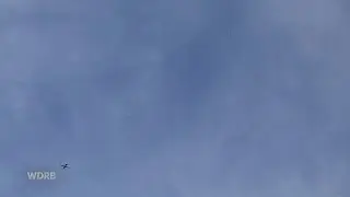 Paratroopers leap from C-130 at Thunder Over Louisville Air Show