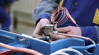 Man Repairs Refrigeration Unit Stock Video