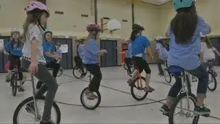 Elementary students stay active on unicycles