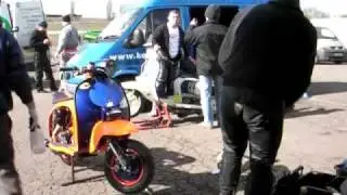 Scooters in paddock at Mallory park