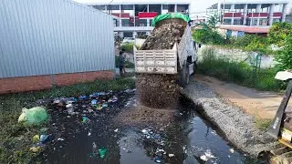 New Project! Dump Truck Discharging Rubble & Debris into Heavily Polluted Urban Waterway.