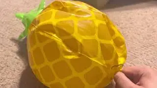 Inflating a pine apple beach ball using my super wubble bubble ball air pump