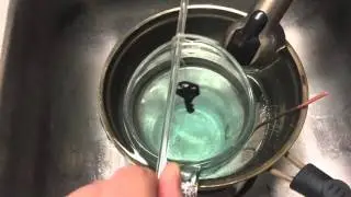 Dissolving (thinning) a brass key in peracetic acid and salt