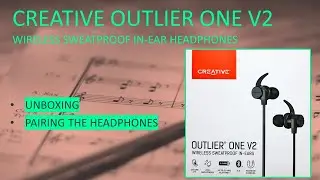 Creative Outlier One V2 распаковывает и подключает наушники