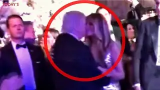 Melania and Trump share a shy kiss at the New Year's party