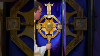 Setting up for Eucharistic Adoration on the eve of Corpus Christi.