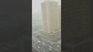 ⚡🌧️ powerful thunderstorm over a Chinese city heavy rain, and bright lightning flashes turning night