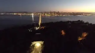 Epic Drone View: Oakland Bay Bridge at Sunset with SF Skyline!