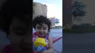 Little baby shows off candy minion