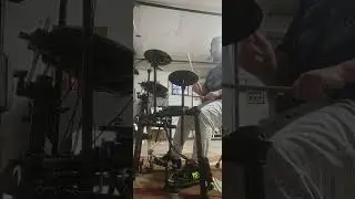Drumming at the house on my electronic kit. 