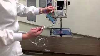 Primary IV tubing and Alaris IV pump