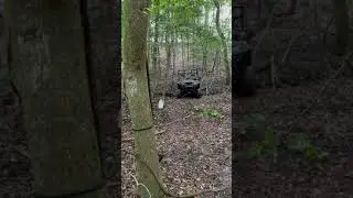 Tracker 500s winching out of swampy creek!! This UTV is handy for deer camp work.