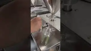 Pressurized single head syringe filling machine