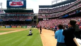First pitch thrown by Staff Sergeant Nicholas Bradley w/ Pres. Bush