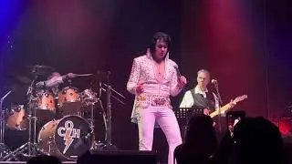 Jimmy Holmes as Elvis singing Trilogy