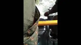 Multitasking by bus driver while driving