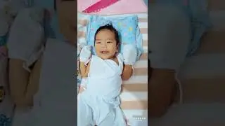 Baby talking to his dad on a phone 3 months old