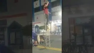 Man in the street w/ 3 knives on a ladder #knife #danger #knivejuggling
