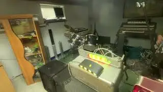 In Waldek's garage in Głęboczek, village head Zenek admires and records.